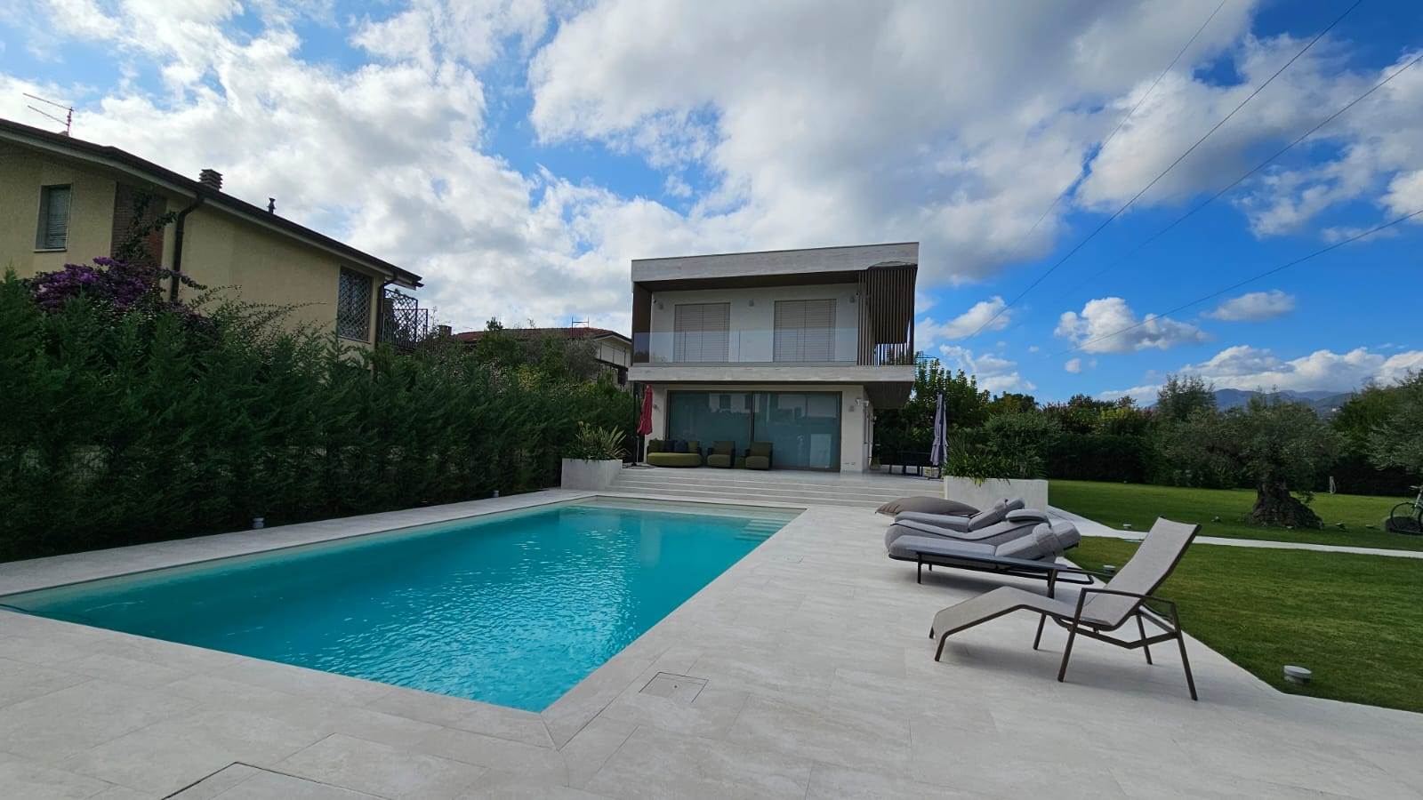 Pool, villa and loungers