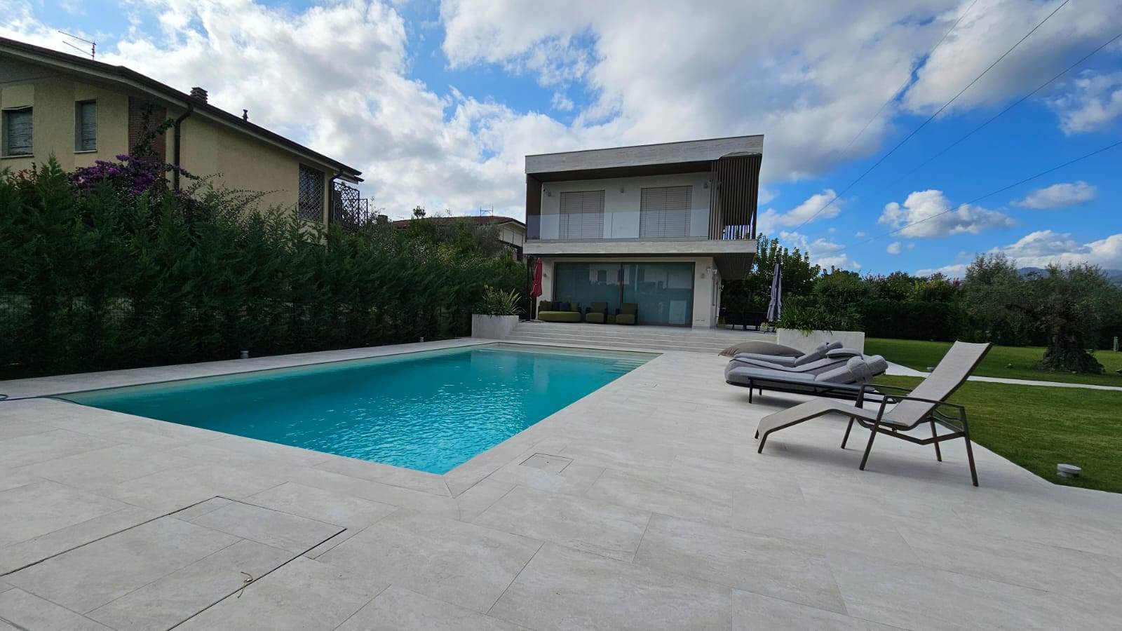 Pool, terrace and sun loungers