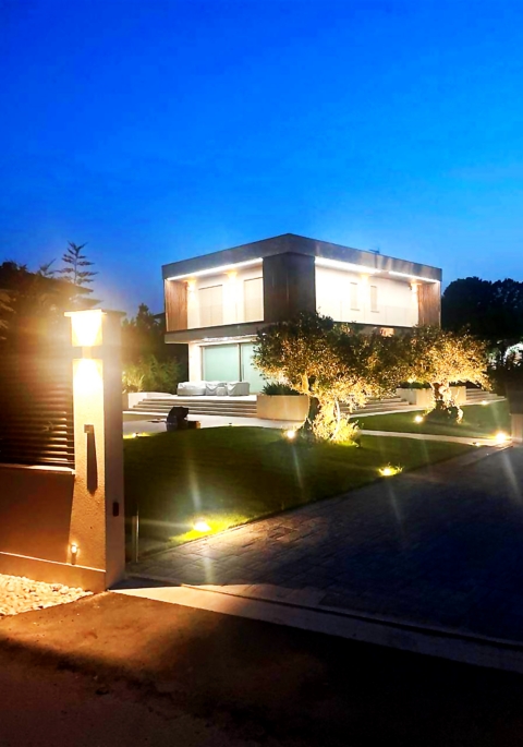 Garden and villa at night