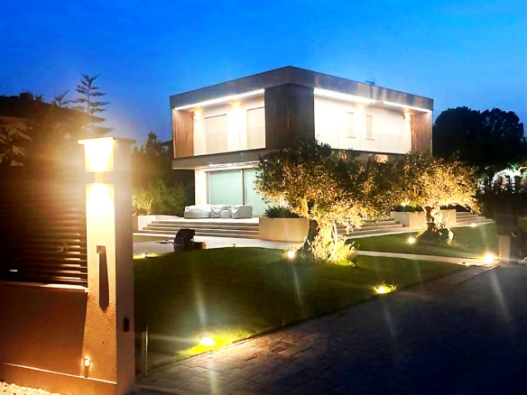 Garden and villa at night